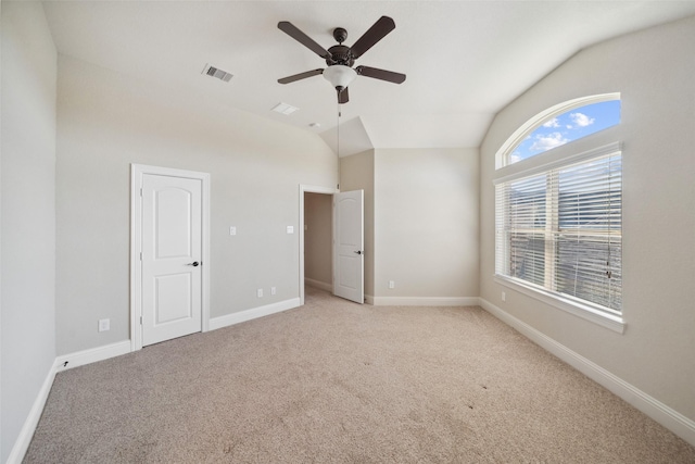 19031 Kimber Creek Ln, Cypress, TX 77429 - unfurnished bedroom with lofted ceiling, light colored carpet, baseboards, and ceiling fan
