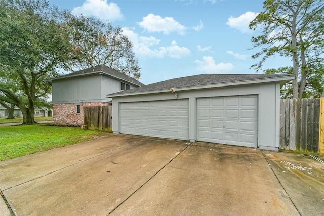 garage with a yard