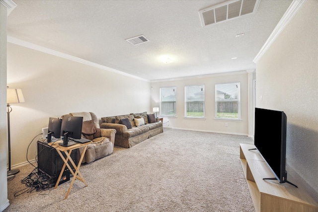 living room featuring ornamental molding, carpet, and a textured ceiling