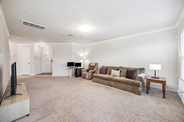 living room featuring crown molding and carpet flooring