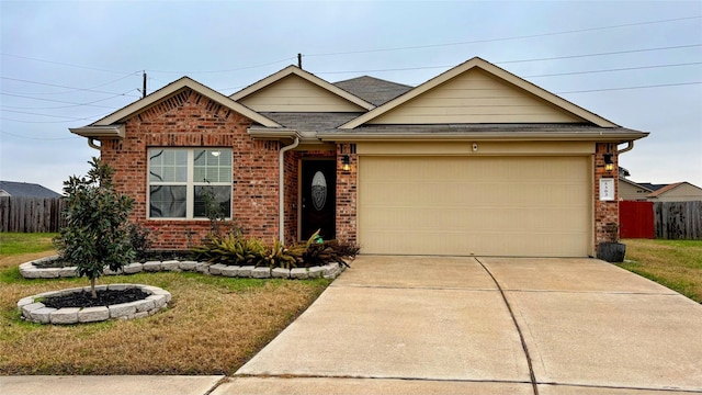 view of front facade with a garage and a front lawn