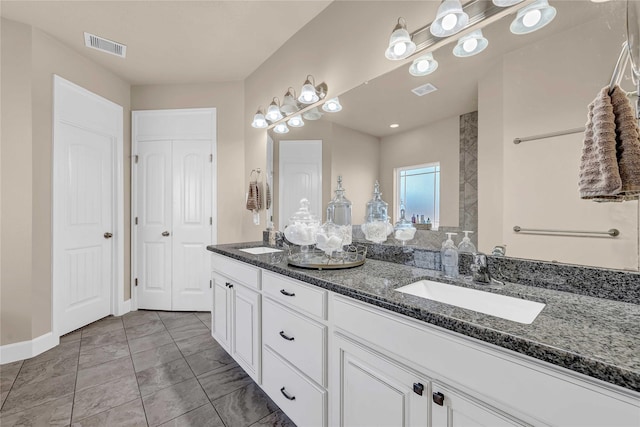 bathroom featuring vanity and tile patterned floors