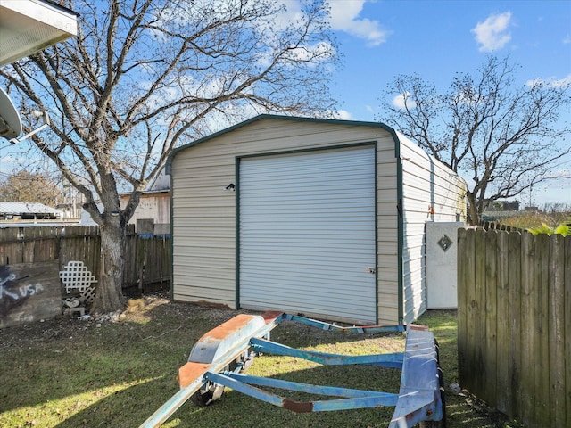 view of shed featuring a fenced backyard