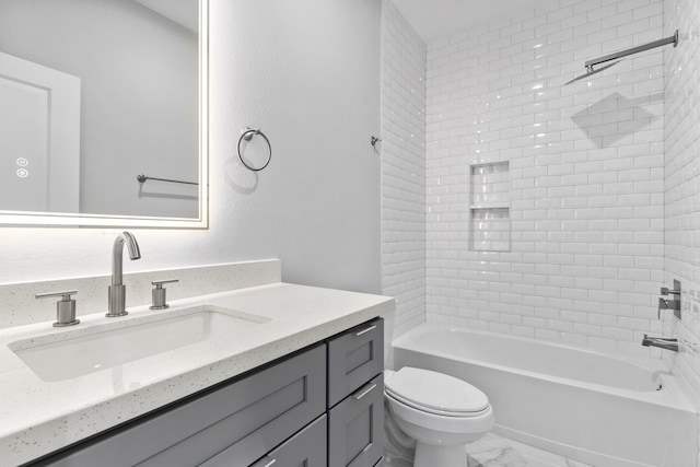 full bathroom with vanity, toilet, and shower / washtub combination