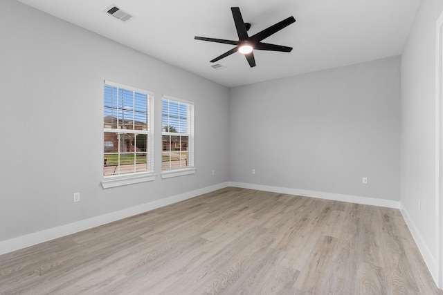 unfurnished room featuring light hardwood / wood-style flooring and ceiling fan