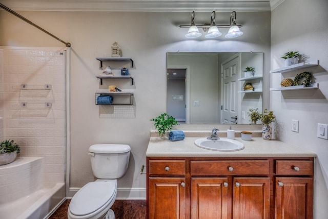 full bathroom with ornamental molding, toilet, shower / washtub combination, and vanity