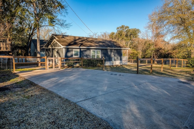 rear view of property with a lawn