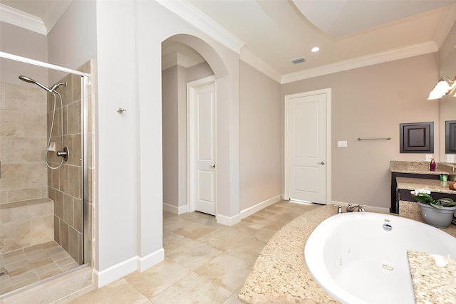 bathroom with visible vents, a stall shower, ornamental molding, a jetted tub, and baseboards