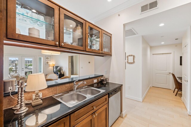 kitchen with french doors, sink, crown molding, light hardwood / wood-style flooring, and dishwasher