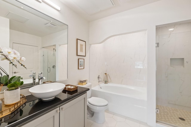 full bathroom featuring tile patterned floors, toilet, separate shower and tub, and vanity