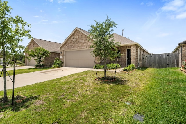 18415 Running Shadow Ct, Hockley, TX 77447 - view of front facade featuring brick siding, a garage, driveway, and a shingled roof