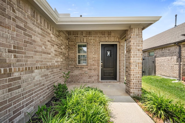 18415 Running Shadow Ct, Hockley, TX 77447 - view of exterior entry with brick siding and fence