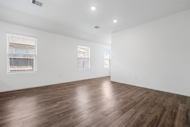 18415 Running Shadow Ct, Hockley, TX 77447 - empty room with dark wood finished floors, recessed lighting, and baseboards
