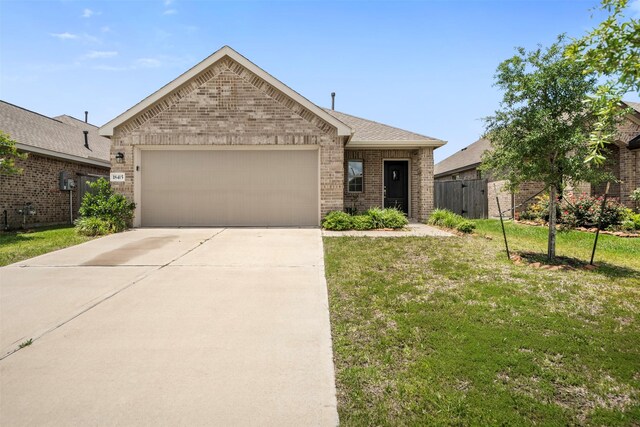18415 Running Shadow Ct, Hockley, TX 77447 - ranch-style home with brick siding, an attached garage, and concrete driveway