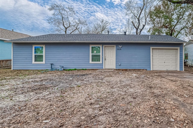 single story home with a garage