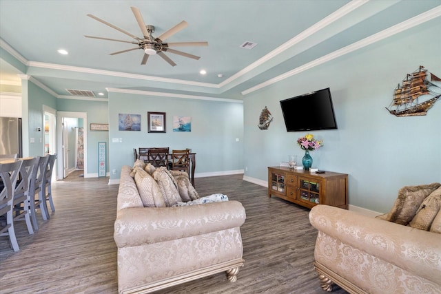 living room featuring crown molding, ceiling fan, and dark hardwood / wood-style flooring