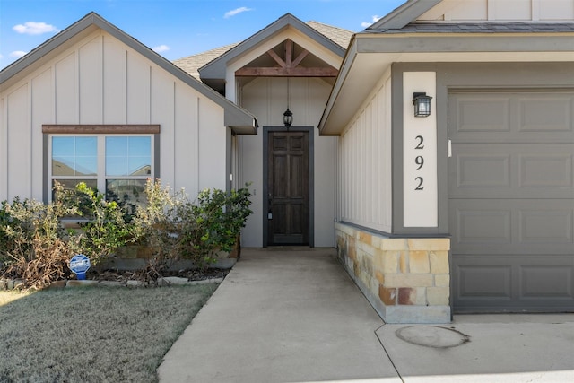 doorway to property featuring a garage