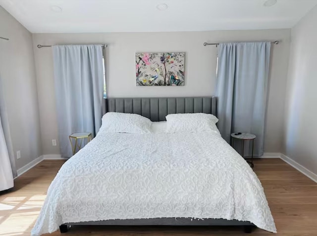 bedroom featuring hardwood / wood-style floors