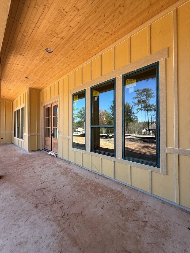 property entrance with a patio area