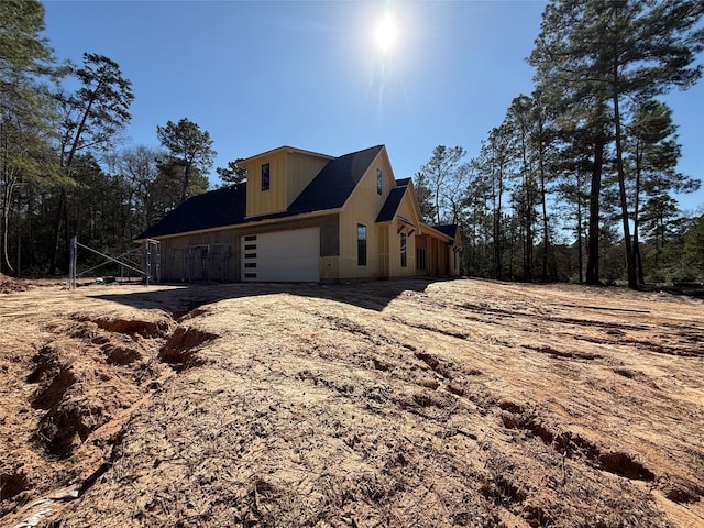 view of home's exterior featuring a garage