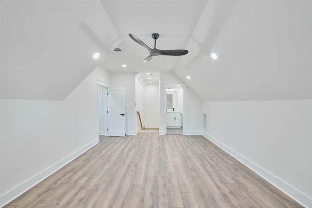 additional living space featuring ceiling fan, visible vents, baseboards, and wood finished floors