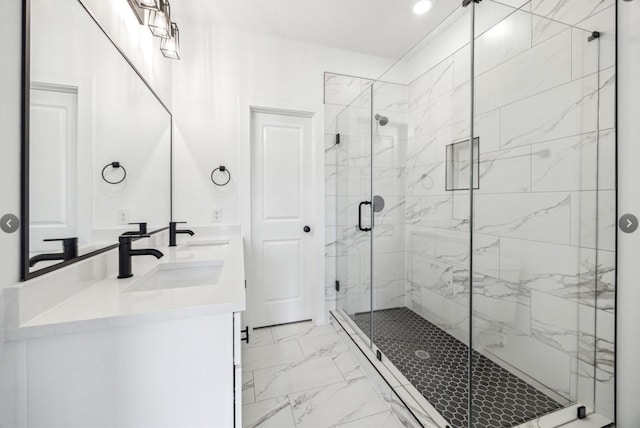 bathroom with vanity and an enclosed shower