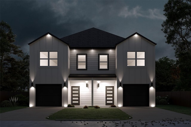 view of front of home with a garage