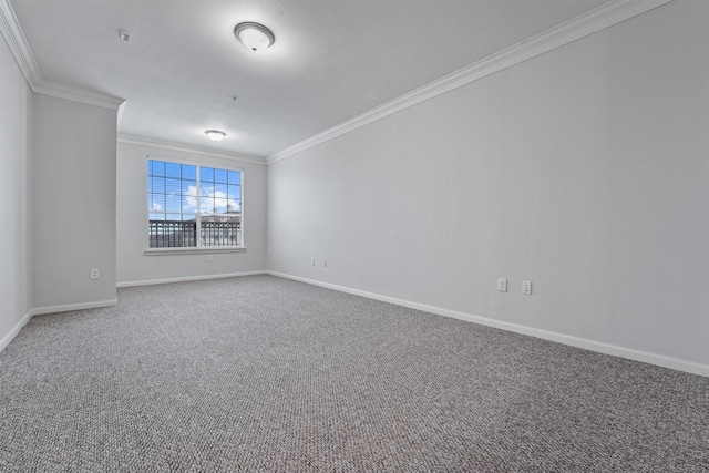 carpeted empty room with crown molding