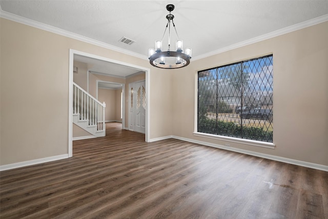 unfurnished dining area with crown molding, dark wood-type flooring, and an inviting chandelier