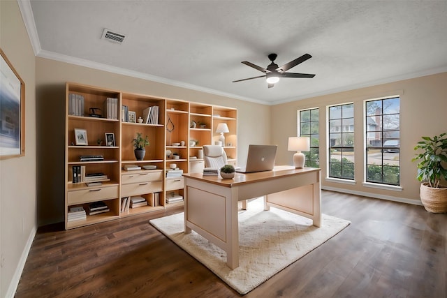 office with ornamental molding, dark wood-type flooring, a textured ceiling, and ceiling fan