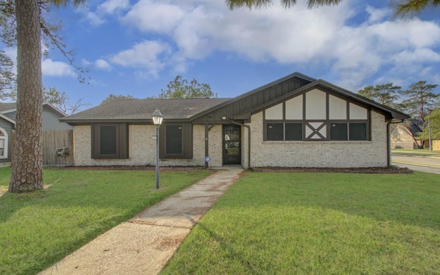 view of front facade with a front lawn