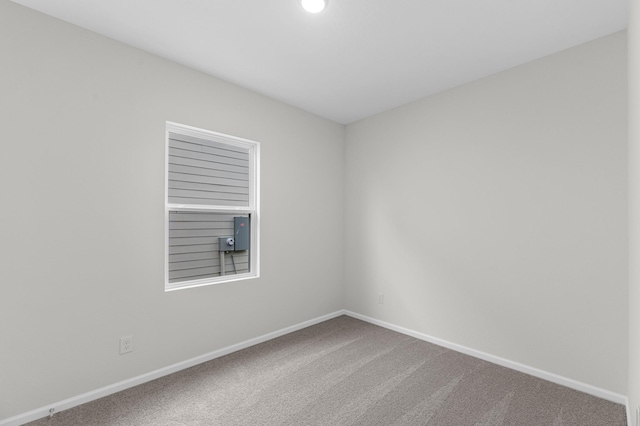 spare room with carpet flooring