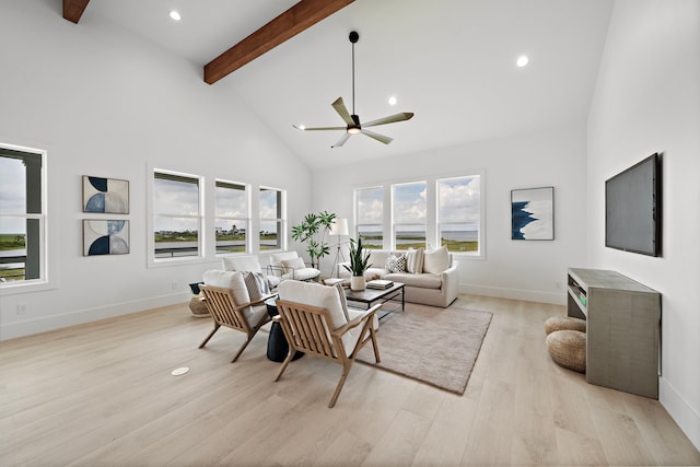 living room featuring beam ceiling, ceiling fan, high vaulted ceiling, and light hardwood / wood-style floors