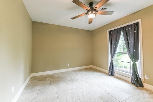 empty room featuring ceiling fan