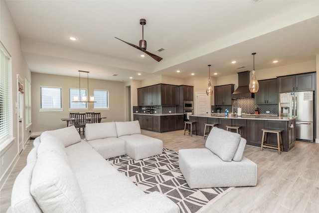 living room with ceiling fan