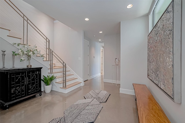 corridor featuring concrete floors