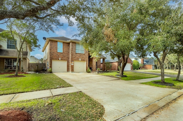 view of front of house featuring a garage and a front lawn