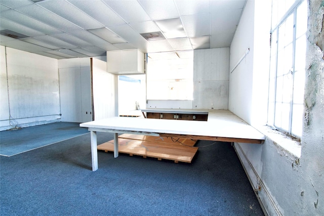 interior space with dark colored carpet