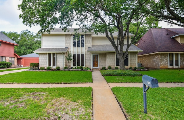 view of front of property with a front lawn