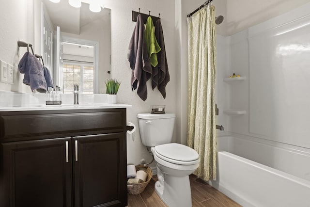 full bathroom with vanity, toilet, and shower / bath combo with shower curtain