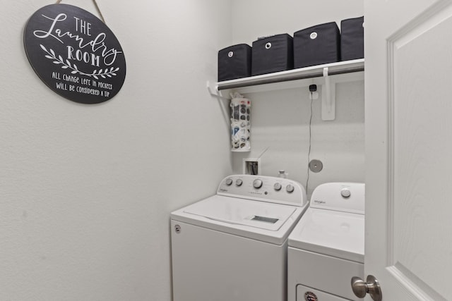 clothes washing area featuring washing machine and dryer