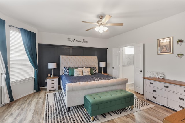 bedroom featuring ceiling fan and light wood-type flooring