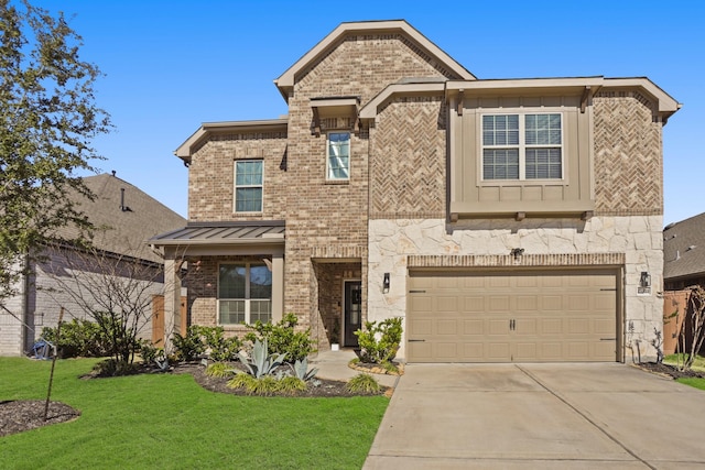 view of front of house featuring a garage and a front yard