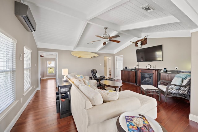 living room featuring ceiling fan, an AC wall unit, vaulted ceiling with beams, and dark hardwood / wood-style flooring