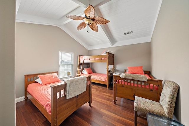 bedroom featuring dark wood-type flooring, vaulted ceiling with beams, and ceiling fan