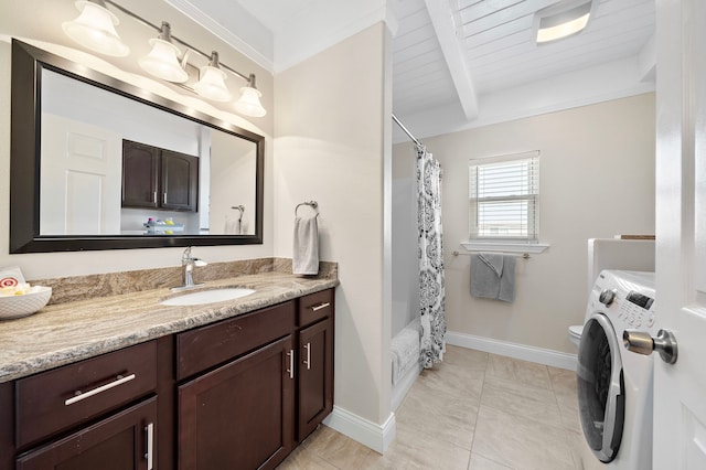 bathroom featuring toilet, wood ceiling, vanity, beamed ceiling, and washer / clothes dryer