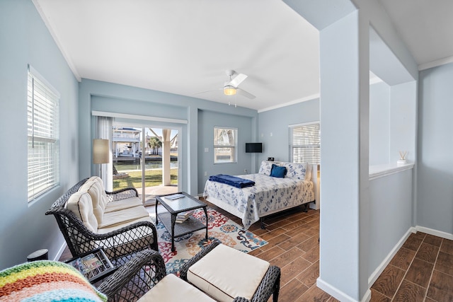 bedroom featuring ornamental molding and ceiling fan