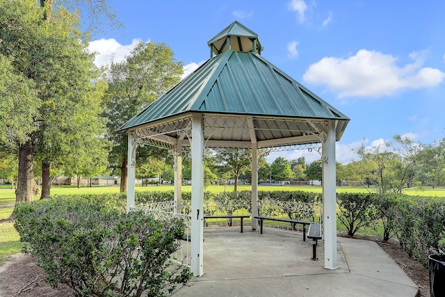 view of home's community featuring a gazebo and a yard