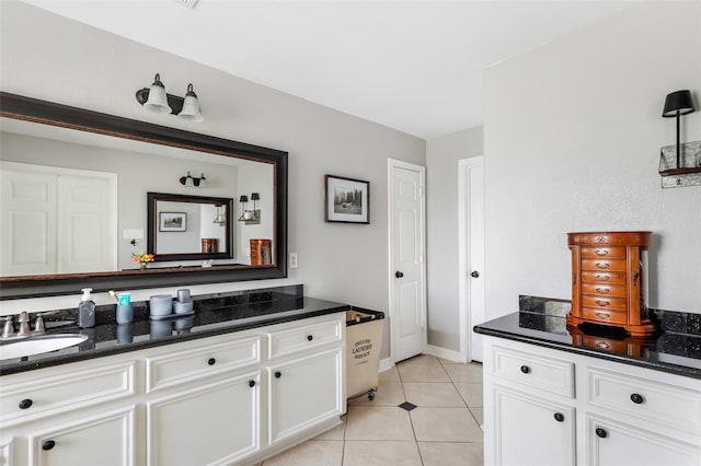19475 Humaya, Porter, TX 77365 - bathroom featuring tile patterned floors, baseboards, and vanity