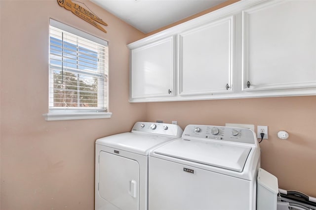 19475 Humaya, Porter, TX 77365 - washroom featuring cabinet space and separate washer and dryer